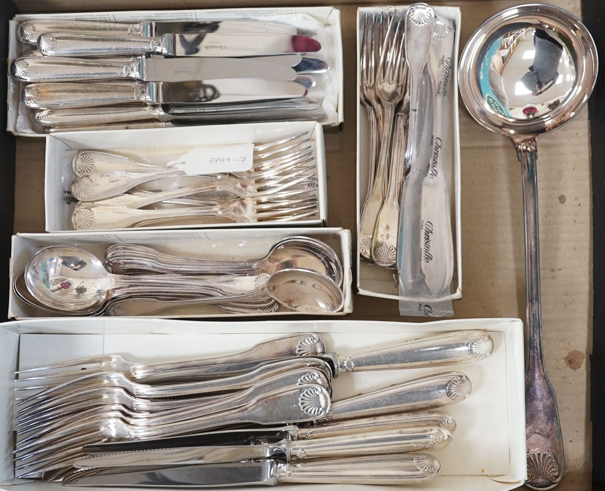 A Chistofle plated canteen of fiddle and shell pattern cutlery